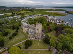 an aerial view of an old building with a park at The Kings Arms in Christchurch
