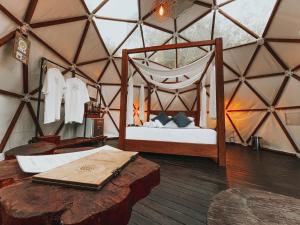 Letto o letti in una camera di Domus Glamping Guatapé