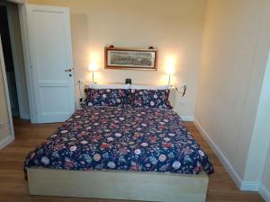 A bed or beds in a room at Amor Fati