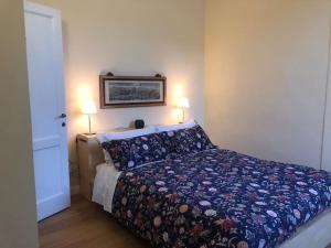 A bed or beds in a room at Amor Fati