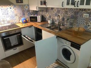 A kitchen or kitchenette at Amor Fati