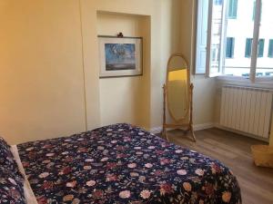 A bed or beds in a room at Amor Fati