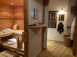 a room with a sauna with towels in a room at Panorama Chalet Heimatliebe in Ladis