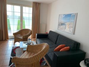Posezení v ubytování Moderne Apartments im Ferienpark auf Rügen