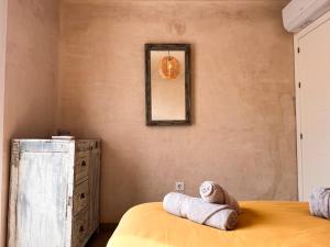 Łóżko lub łóżka w pokoju w obiekcie Tarifa Cozy House - Minimaliste