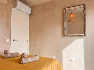 Łóżko lub łóżka w pokoju w obiekcie Tarifa Cozy House - Minimaliste