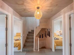 Łóżko lub łóżka w pokoju w obiekcie Tarifa Cozy House - Minimaliste