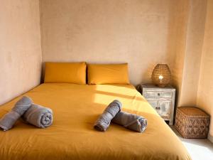 Łóżko lub łóżka w pokoju w obiekcie Tarifa Cozy House - Minimaliste