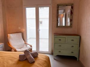 Łóżko lub łóżka w pokoju w obiekcie Tarifa Cozy House - Minimaliste