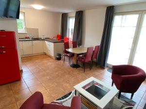 Kuchyň nebo kuchyňský kout v ubytování Moderne Apartments im Ferienpark auf Rügen