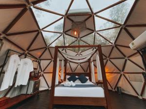 Letto o letti in una camera di Domus Glamping Guatapé