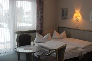 Postel nebo postele na pokoji v ubytování Hotel Gasthof Seehof