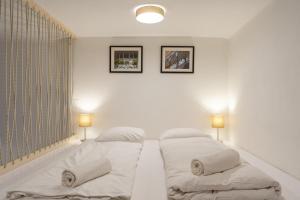 Posteľ alebo postele v izbe v ubytovaní Modern Stylish Loft next to New York Palace