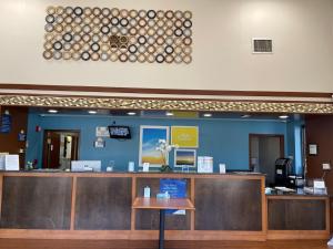 a waiting area of a hospital with a counter at Days Inn by Wyndham Fayetteville-South/I-95 Exit 49 in Fayetteville