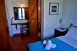 En eller flere senge i et værelse på Afroditi villa + 24 billeder