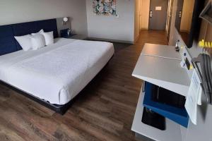 Postel nebo postele na pokoji v ubytování Microtel Inn & Suites by Wyndham Rehoboth Beach