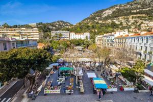 an aerial view of a city with buildings and trees at Market Square 2 bedrooms 2 baths AC private garage in Beaulieu-sur-Mer