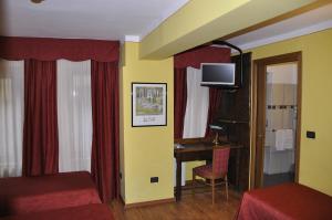 TV o dispositivi per l'intrattenimento presso Hotel Sud Ovest