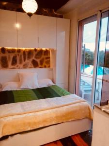 Säng eller sängar i ett rum på Villa Malika Marrakech