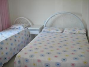 Cama o camas de una habitación en Apartamento frente mar