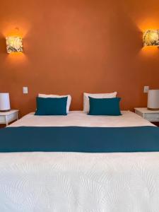 Postel nebo postele na pokoji v ubytování Hotel Casa Coson