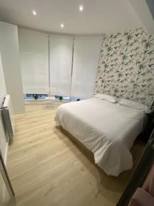 Postel nebo postele na pokoji v ubytování apartamento FLORENCIA