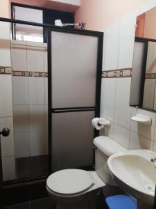 Koupelna v ubytování Centro Macas