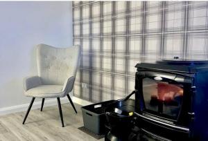 Posezení v ubytování Téach Cara - 5 Bedroom - Culdaff