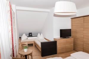 Ένα ή περισσότερα κρεβάτια σε δωμάτιο στο Altenbergerhof