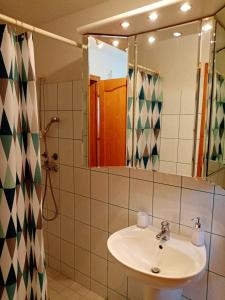 Kúpeľňa v ubytovaní Magnólia Apartman Zalakaros