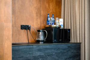 Príslušenstvo na prípravu kávy alebo čaju v ubytovaní Rich Sopot by OneApartments + 15 fotografií