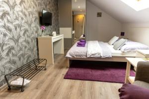 Postel nebo postele na pokoji v ubytování NISA Apartments