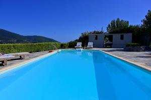 The swimming pool at or close to Danai villa