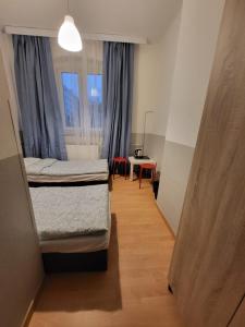 Posteľ alebo postele v izbe v ubytovaní Tanie spanie Wilda - Zameldowanie bezobsługowe -
