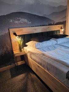 Posteľ alebo postele v izbe v ubytovaní Karolowy pokoje&apartamenty