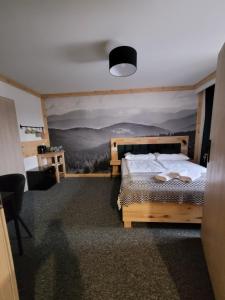 Posteľ alebo postele v izbe v ubytovaní Karolowy pokoje&apartamenty