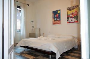 Katil atau katil-katil dalam bilik di Incantevole Appartamento De Angeli