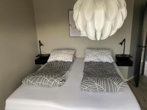Postel nebo postele na pokoji v ubytování North - City Center Apartments