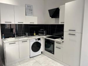 Una cocina o kitchenette en Bel appartement T3 centre Nimes