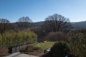 a view of a garden with trees and a playground at Top Wohnung mit traumhaftem Fernblick in 1A-Lage! in Hagen