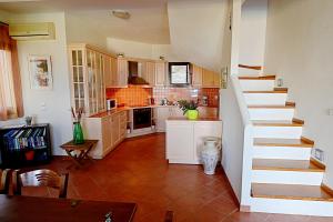 A kitchen or kitchenette at Danai villa