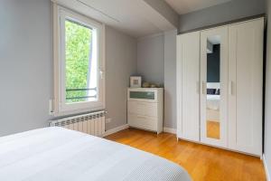 Posteľ alebo postele v izbe v ubytovaní Apartamento a 5min de la playa de Ondarreta
