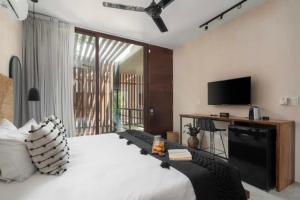 Et tv og/eller underholdning på Apartamento Vacacional Tulum Quintana Roo Mexico