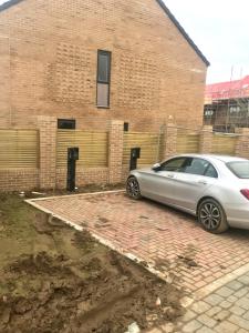 a silver car parked in front of a brick building at 27 William Jessop Way Bristol BS13 0RL in Whitchurch