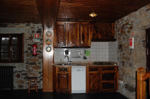 Köök või kööginurk majutusasutuses Casa da Janal