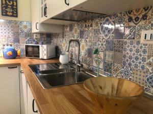 A kitchen or kitchenette at Amor Fati