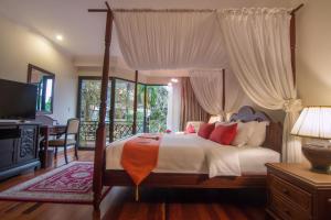Letto o letti in una camera di Palace Residence & Villa Siem Reap
