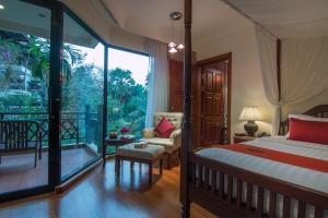 Letto o letti in una camera di Palace Residence & Villa Siem Reap