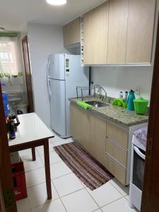 Η κουζίνα ή μικρή κουζίνα στο Apartamento Rio das Ostras
