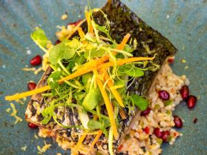 a plate of food with greens and vegetables on it at Mercure Benidorm in Benidorm